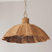 handwoven rattan pendant light with aged brass hardware