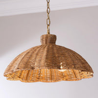 Handwoven rattan pendant light with aged brass hardware