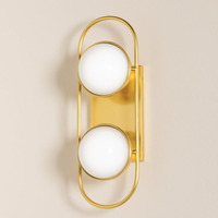 Lyra Aged Brass Globe Vanity Sconce