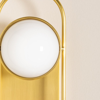 Lyra Aged Brass Globe Vanity Sconce