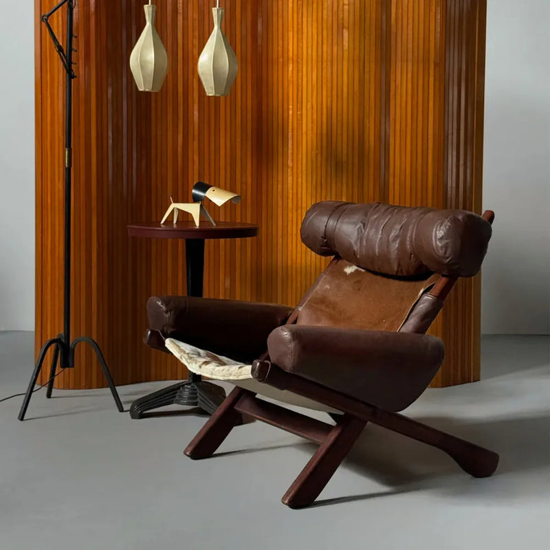 Swedish Cow Hide Armchair – Nordic Leather Accent Chair for Rustic Modern Decor